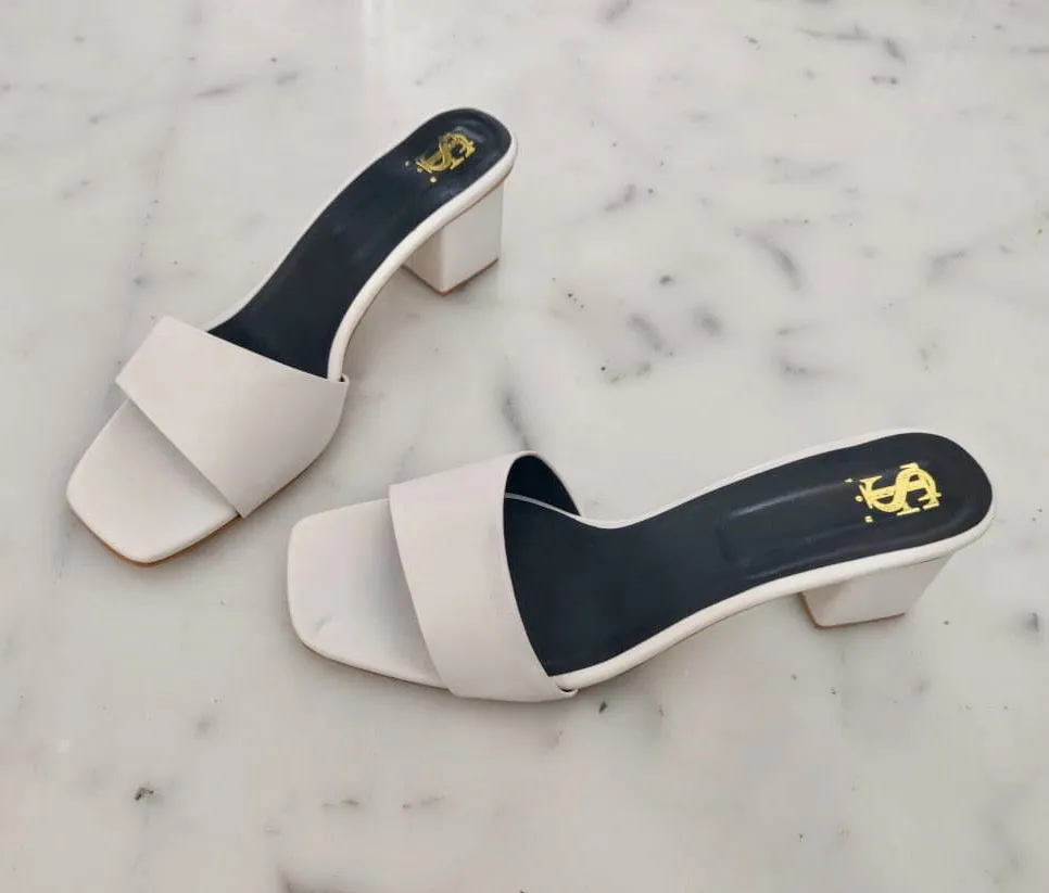 Asymetrical White mid block heels