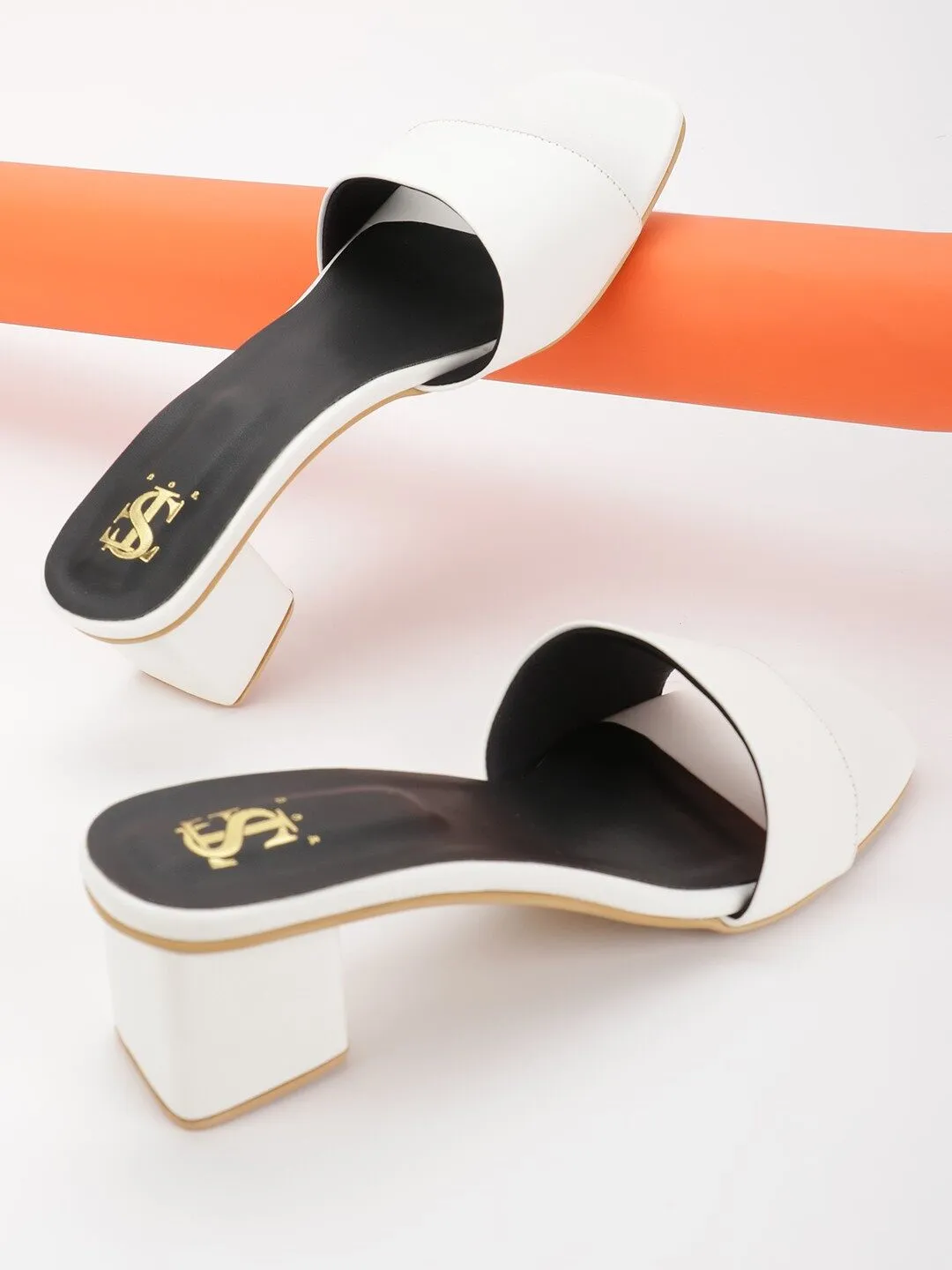 Asymetrical White mid block heels